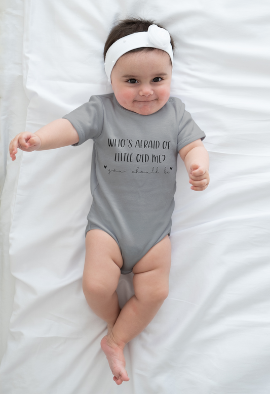 White Taylor Swift Baby Onesie – "Who’s Afraid of Little Old Me?"